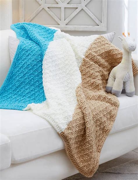 FREE chunky knit blanket pattern. Knit a blanket in a
