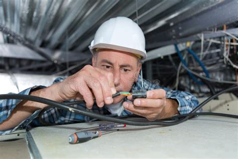 electrician fixing wiring