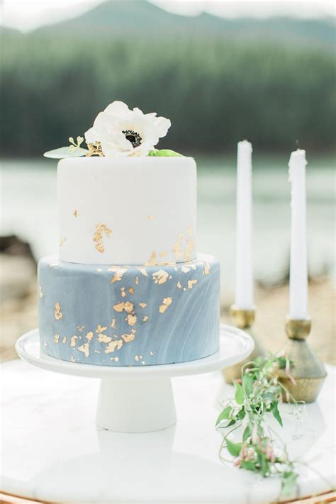 Elegant dusty blue and gold wedding cake at Springfield, Missouri wedding venue Greenhouse Two