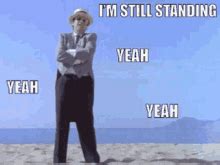 elton john i'm still standing gif