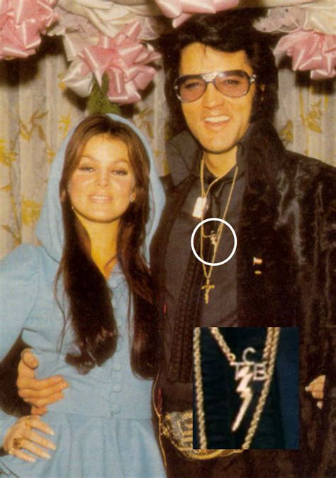 elvis wearing tcb necklace