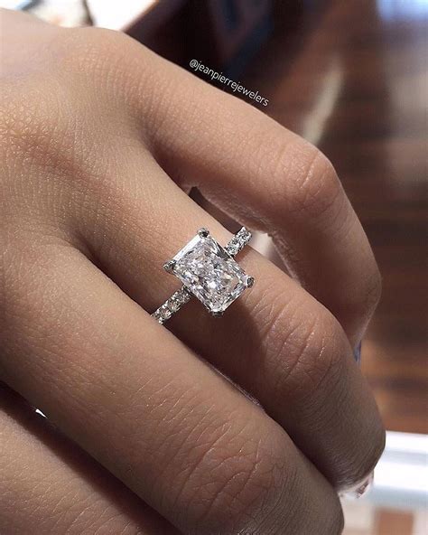 engagement rings solitaire emerald cut