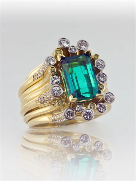 engagement rings with emerald accents
