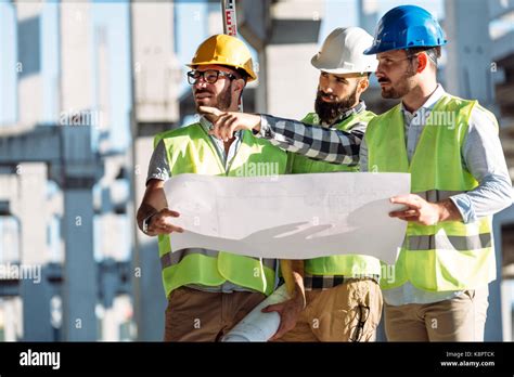 Engineers Working on Construction Site