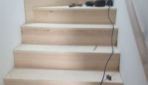 habillage d'un escalier bêton avec des marches en bois 