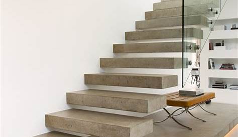 Escalier design en béton avec un palier intermédiaire