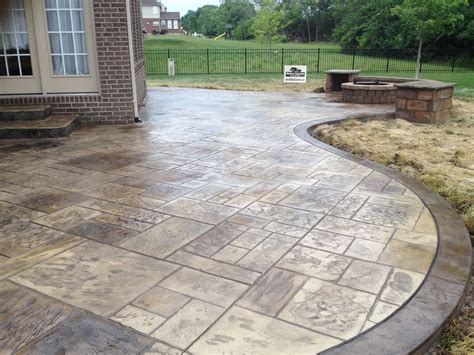 Decorative Concrete Patio with Seating Wall, Columns and Fire Pit Mason