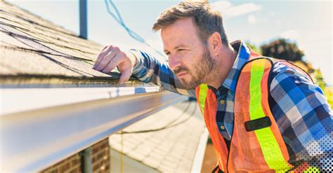 examining roof for hail damage