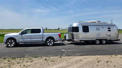 f150 lightning range with trailer