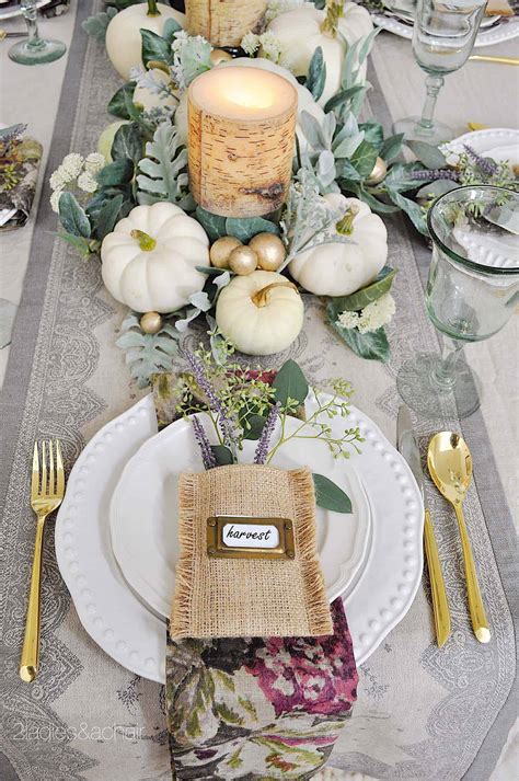Two It Yourself Fall table decorations on a burlap runner