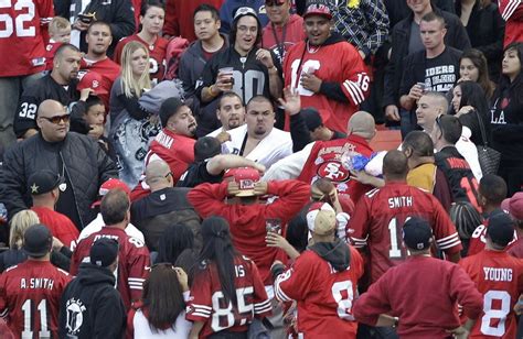 fans fighting at football games