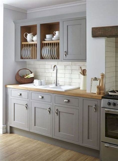 Uncover the Enchanting World of Farmhouse Grey Kitchen Cabinets