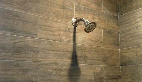 Faux wood effect bathroom floor and wall tiles. From www.wallsandfloors