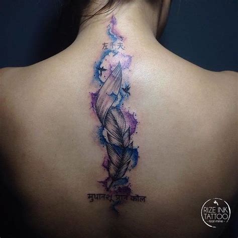 Feather elegant spine tattoo ideas