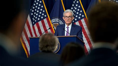 The Latest Powell sees current slowdown as temporary
