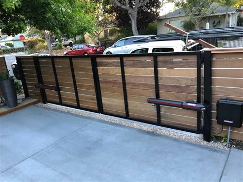 Fence With Automatic Gate