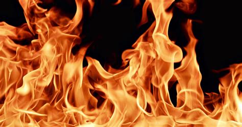 Set Your Brand on Fire with Striking Black Background Designs - SEO Title for Fire Black Background.