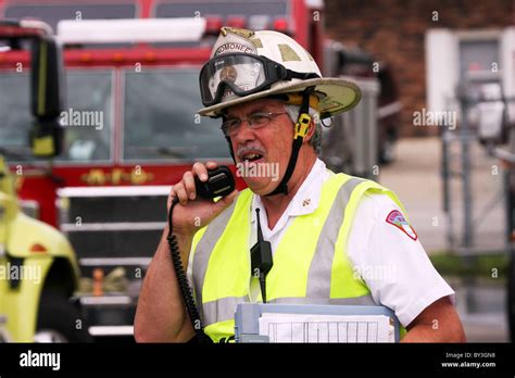 firefighter talking on radio