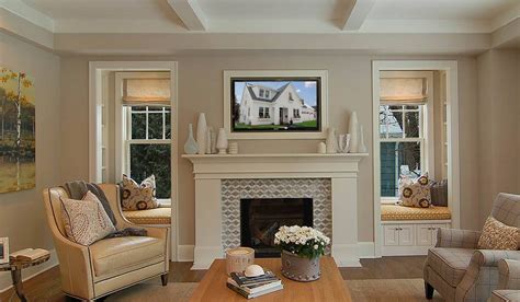 Window seats on both sides of fireplace. Living room, family room with