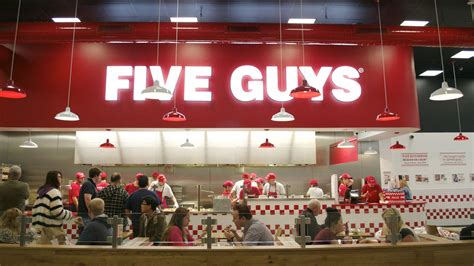 five guys disney village