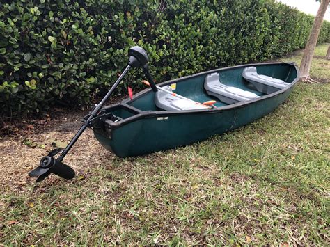 Coleman Scanoe Flat back canoe with trolling motor for Sale in