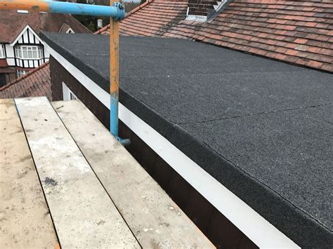 flat roof replacement with glue down felt