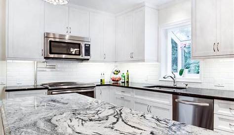 White Kitchen Great Room with Speckled Pearl Granite Kitchen