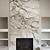 floor to ceiling marble tile fireplace