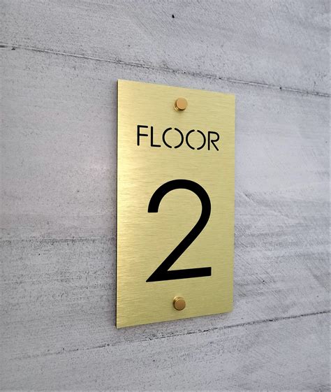 Efficient Navigation Made Easy with Floor Number Signs - Enhance Wayfinding in Your Building!