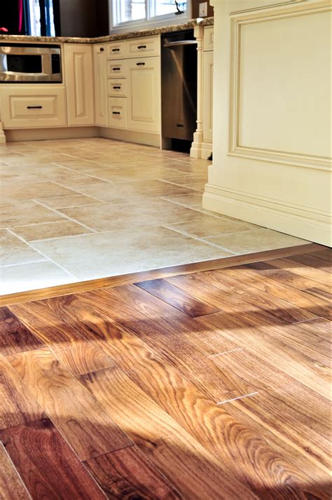 floor tile up against wood floor images