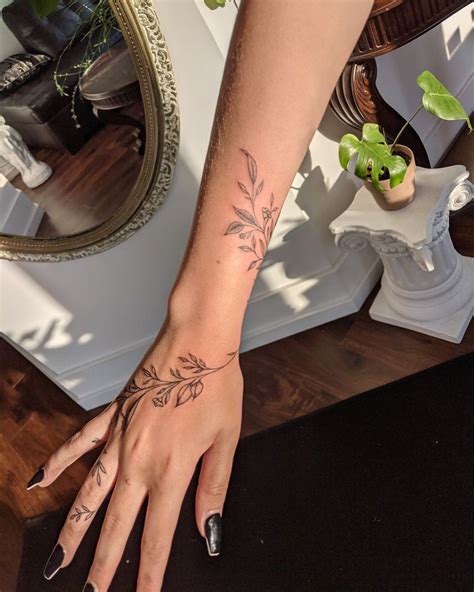 Floral Hand Tattoos