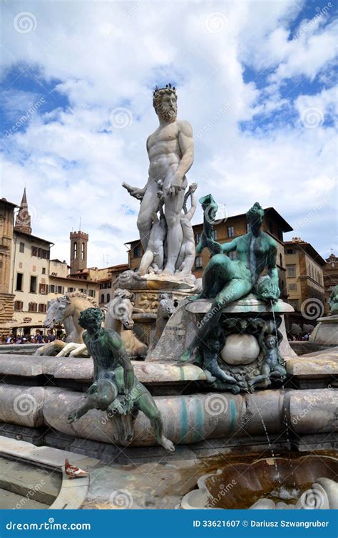 A picturesque scene of a fountain in Florence, surrounded by lush greenery and vibrant flowers. 