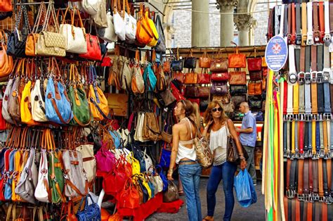 A shop display showcasing leather goods and handcrafted souvenirs in Florence