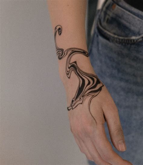 Flow Hand Tattoo