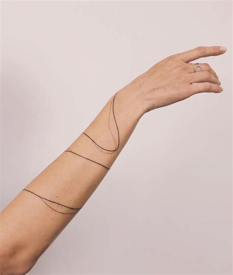 Flow Line Tattoo Arm