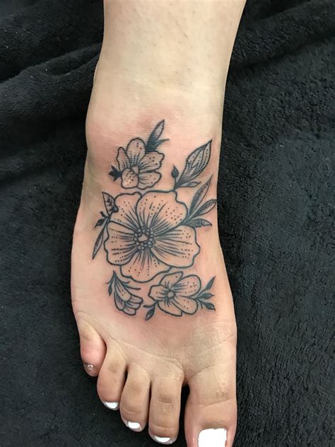 +21 Flower Foot Tattoo Designs References