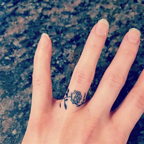 The Best Flower Ring Tattoo Designs References