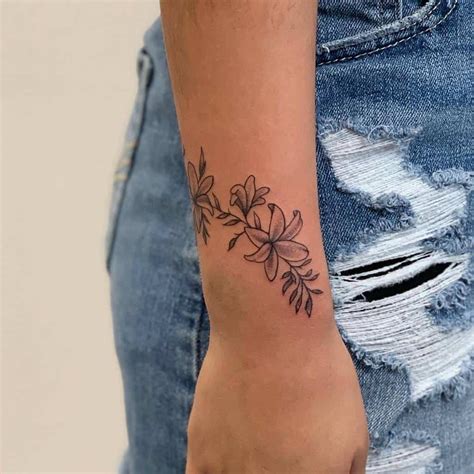 Cool Flower Wrist Tattoo Designs References