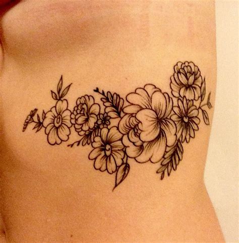 Controversial Flower Rib Tattoo Designs 2023