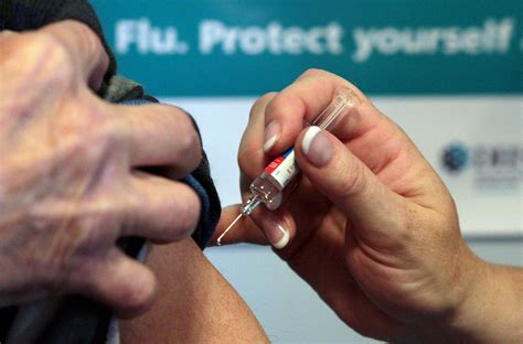 flu jab with a cold