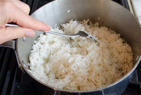 Fluffing rice with a fork