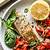 foil-baked salmon recipe with basil pesto and tomatoes