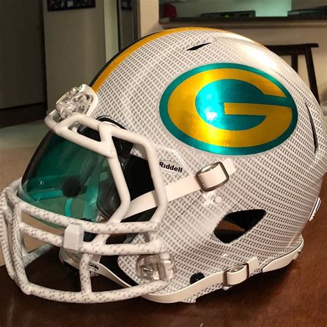 football field green football helmet