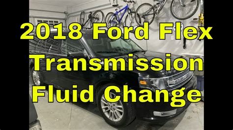 Topping off automatic transmission fluid and checking flex plate with