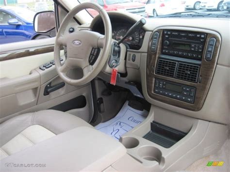 Interior view of a well-maintained 2004 Ford Explorer, showcasing its spaciousness and dashboard layout