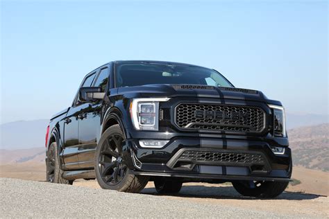 ford f-150 trucks taking off with loud motors