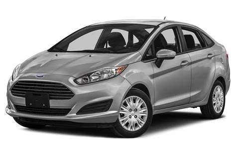 A silver 2014 Ford Fiesta parked on a city street, showcasing its compact and stylish design