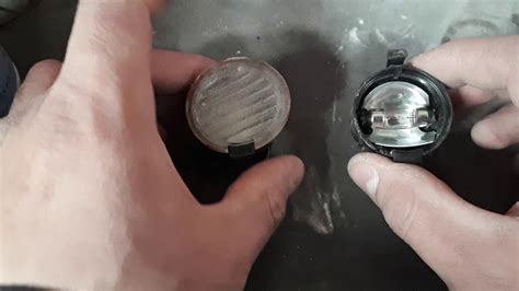 ford fusion puddle light bulb size