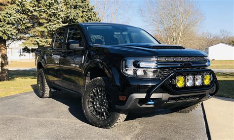 Customized Ford Maverick build with aftermarket wheels and lift kit