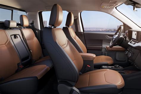 Interior view of a customized Ford Maverick showing seating and dashboard